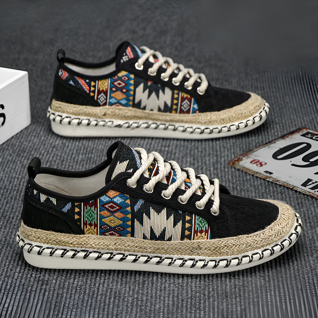 Men's beige and black cloth casual shoes with round toe and colour-block pattern, side view.