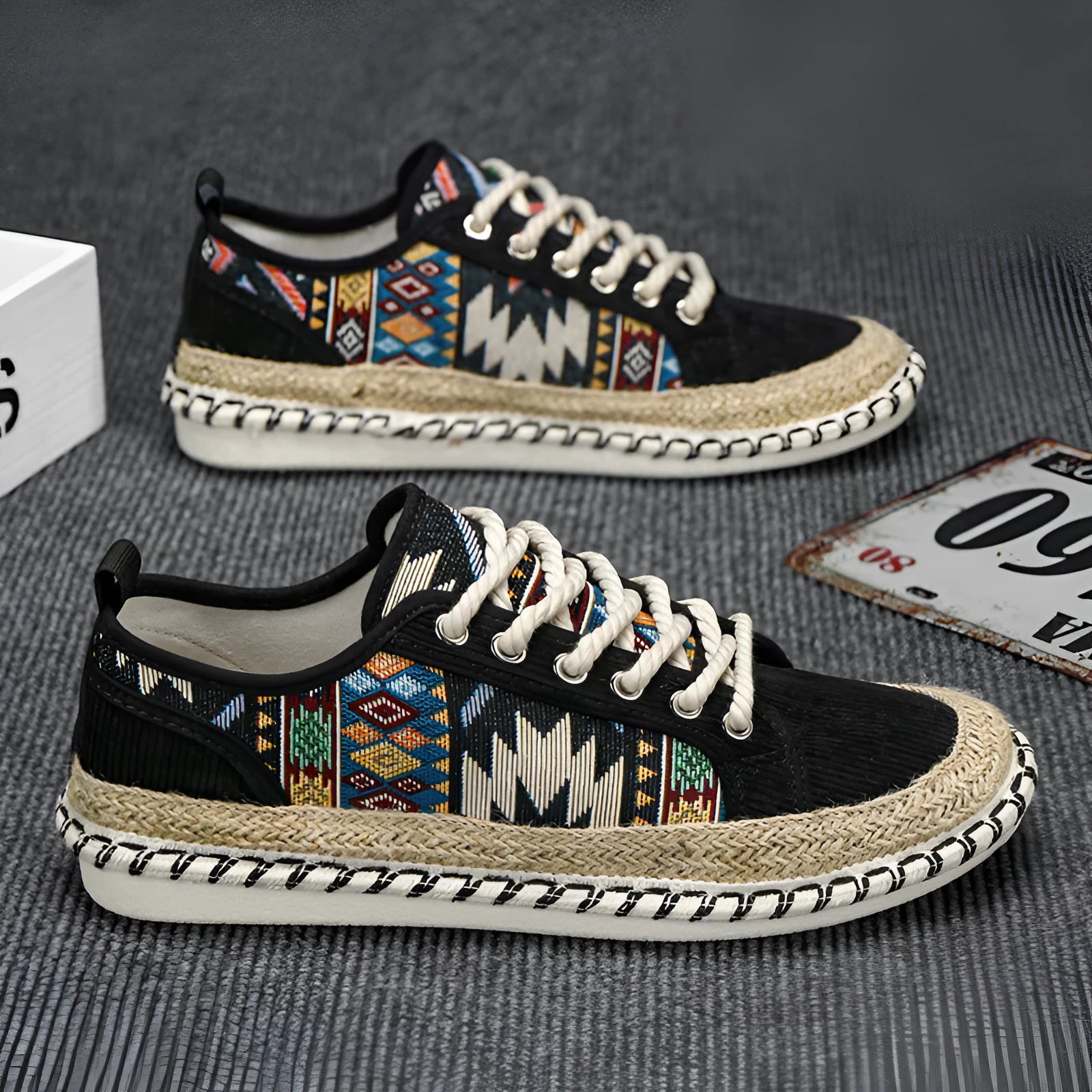 Men's beige and black cloth casual shoes with round toe and colour-block pattern, side view.