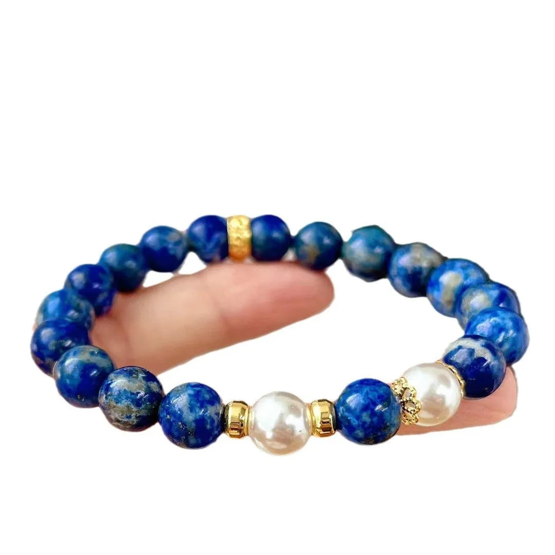 A lapis lazuli gemstone bracelet with a green and gold stone aesthetic in a Chinese artistic retro style.