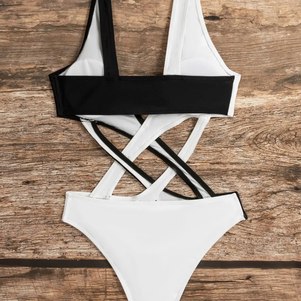 White women's one-piece swimsuit with colour block design and hollow out detail