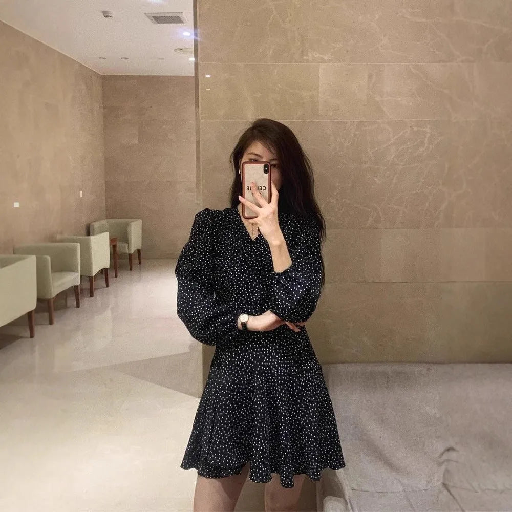 Women's black polka dot high waist midi dress with long sleeves in polyester fabric