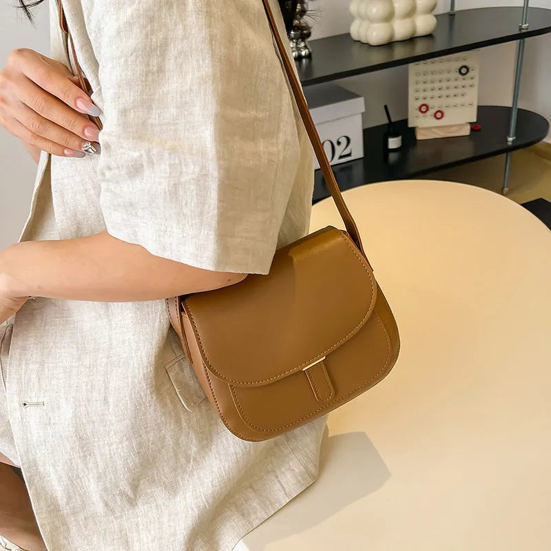 Small square PU crossbody bag for women in black, brown, and coffee with single shoulder strap