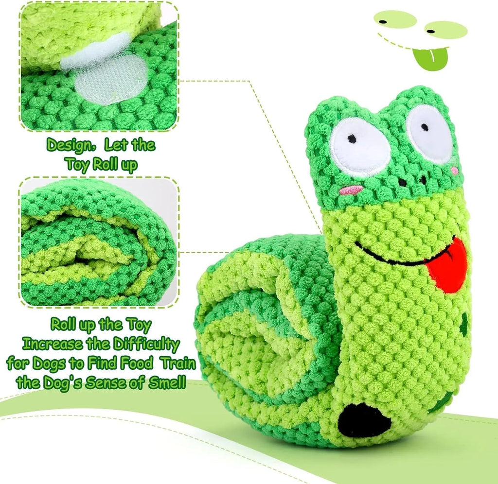 Reversible velvet squeak dog toy shaped like a snail with hidden food holes for foraging puzzles.