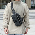 Men's black PU leather crossbody shoulder bag with printed chest design featuring windmill pattern detail