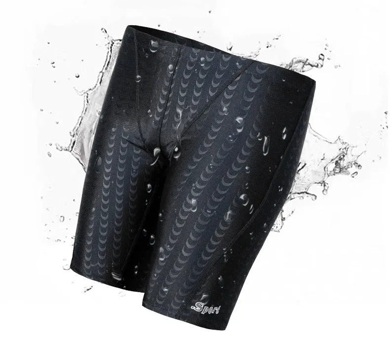 Men's solid colour swimming trunks in waterproof shark skin polyester fabric