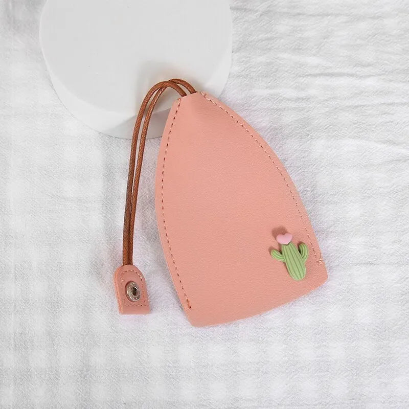 Colourful cartoon PU leather pull-out key case for car keys, shown open and closed