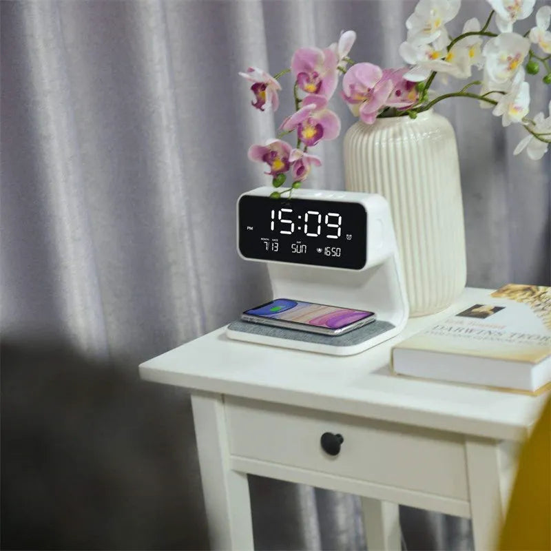 White bedside lamp with wireless charging pad and LCD clock display on base