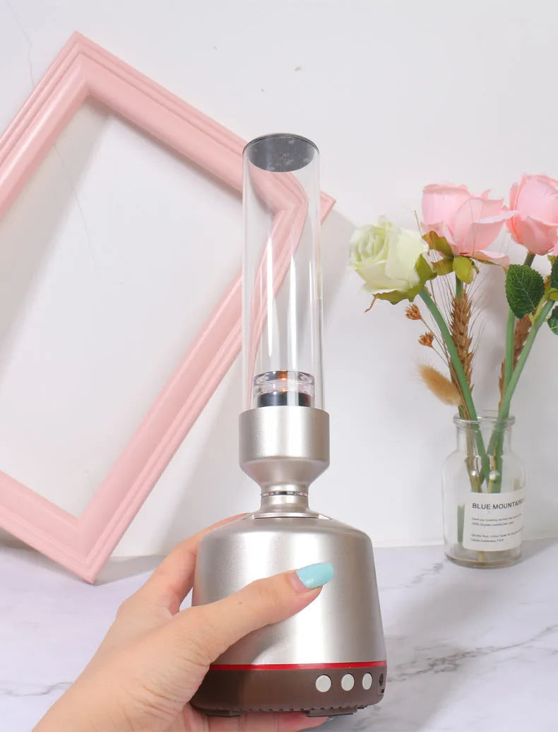 White silver Bluetooth speaker night light standing upright, showing push buttons and slim 277mm tall design.