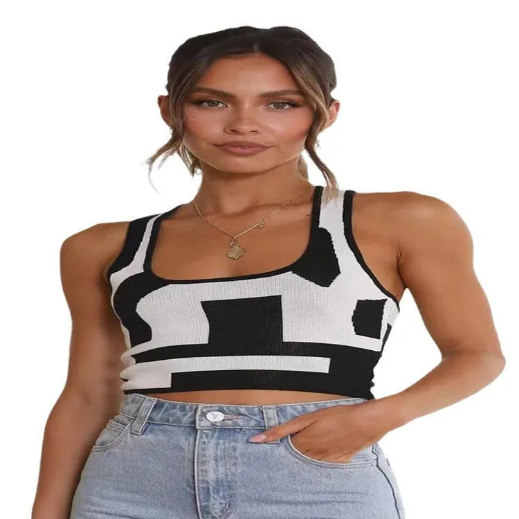 Women's slim fit camisole vest with U collar and exposed navel design in a contrasting colour.