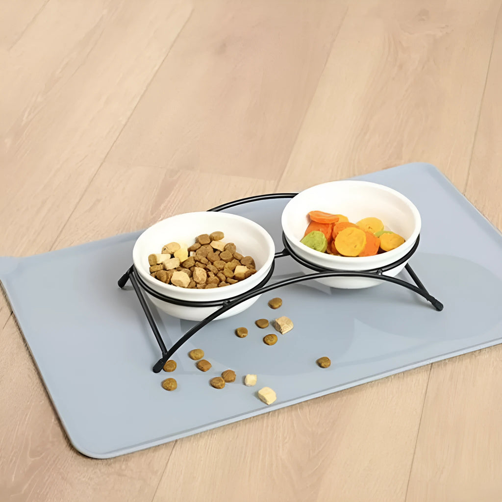 Silicone pet feeding placemat in blue colour under a dog bowl