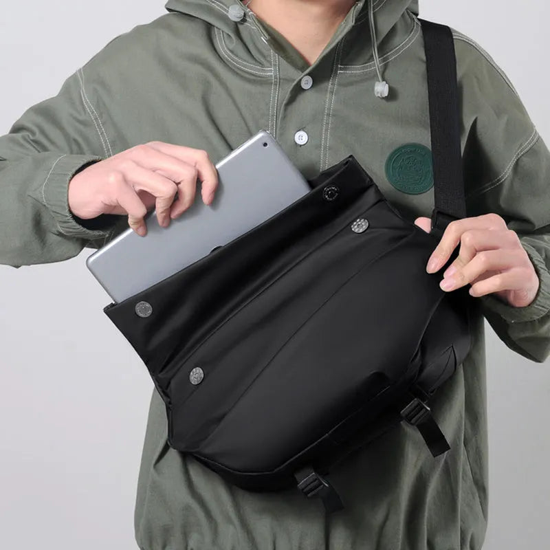 Grey men's medium PU leather crossbody sling bag with zipper and shoulder strap.