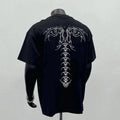 Men's loose fit pure cotton short sleeve shirt in black, showing printed design.
