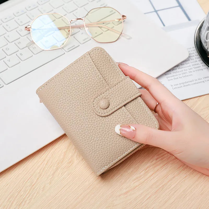 Ladies short wallet with lychee pattern in beige, pink, black or red colours