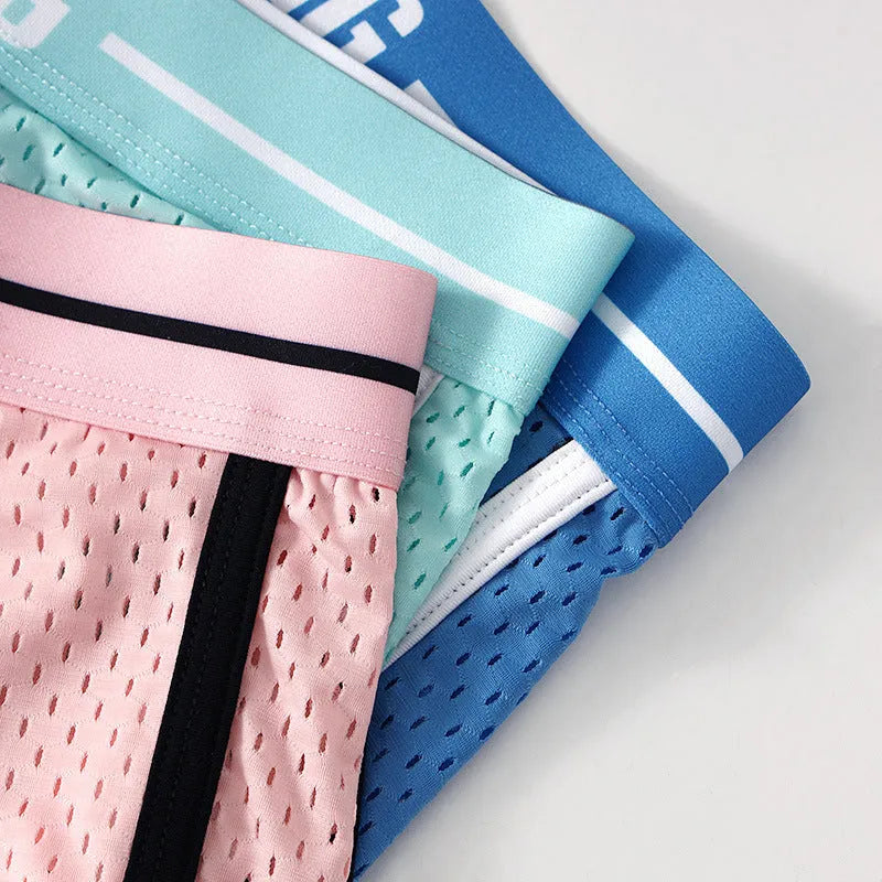 Men's loose Ice Silk nylon boxers in black, white, dark gray, blue, pink, and light green colours