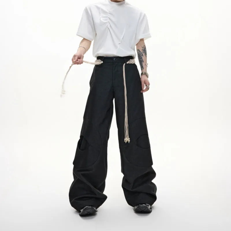 Men's dark blue straight-leg cotton jeans showing front view with zip fly and pocket detailing.