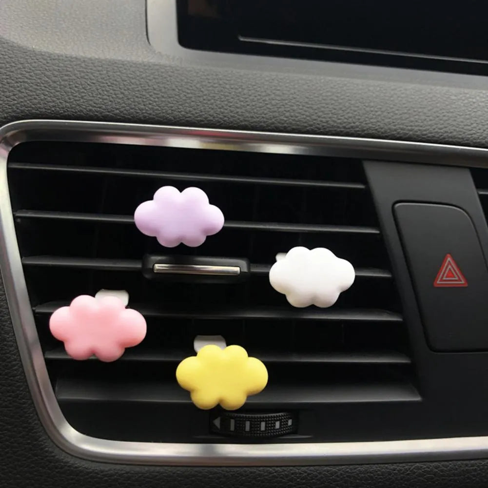 Resin Baiyun cartoon car fragrance clip for air vents in assorted colours.