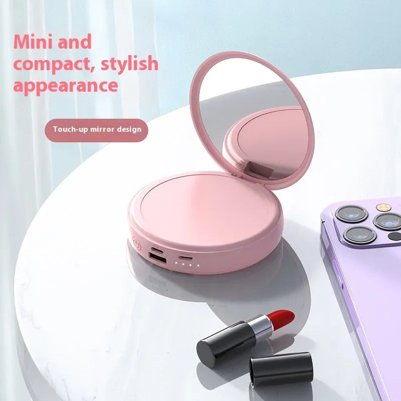 Small portable power bank with USB charging and built-in data cable in white plastic shell