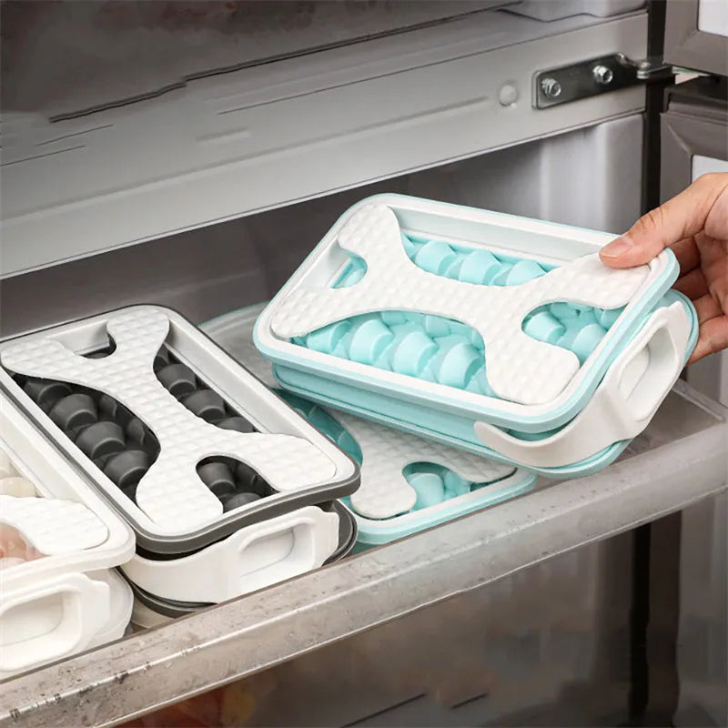 Light grey 2-in-1 silicone ice ball mould and water bottle with lid, showing portable design.