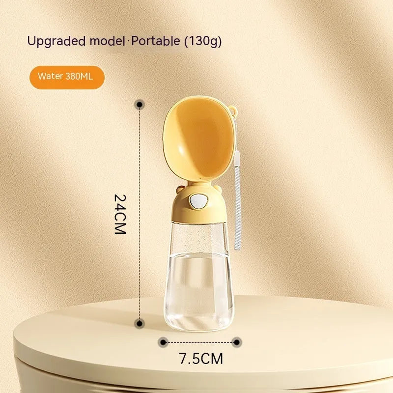 Portable dog water bottle and feeder bowl for outdoor travel in yellow, pink, or brown.