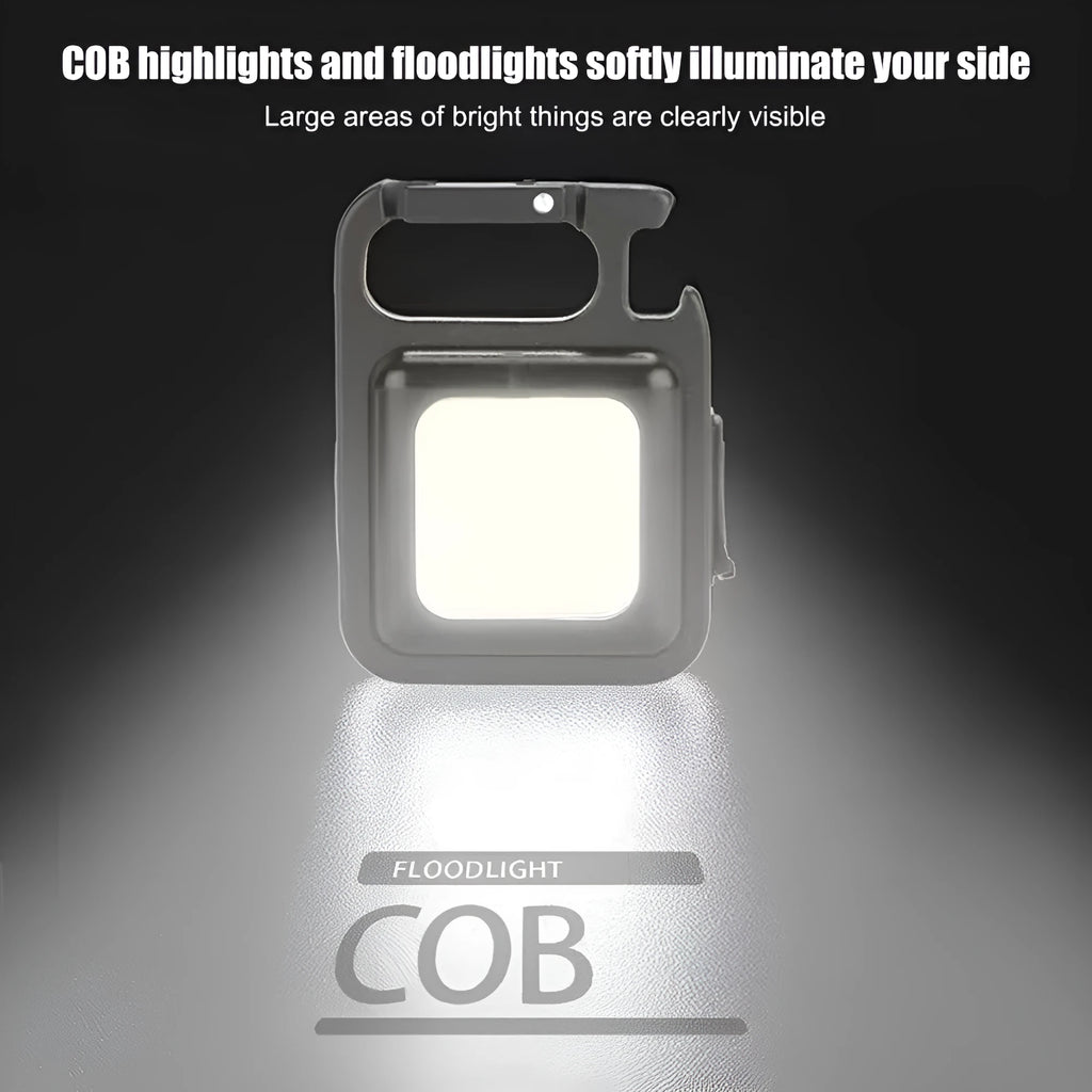 Mini portable COB keychain flashlight with USB recharge, 400 lumens, and built-in bottle opener