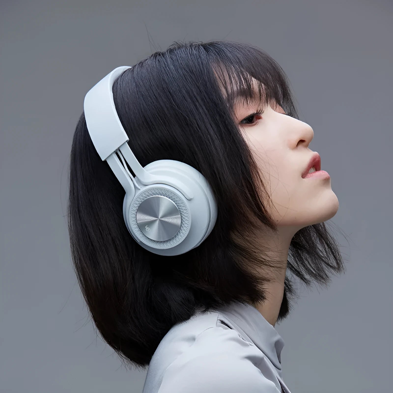 Sports wireless Bluetooth headset in black, green, grey, and red colour options.