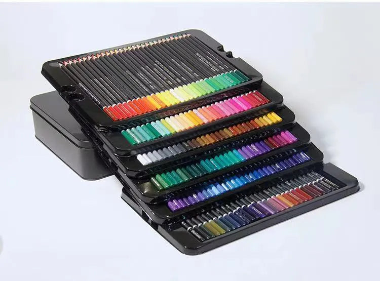 Open metal tin showing 180 colourful oily pencils with wooden casings arranged in rainbow order
