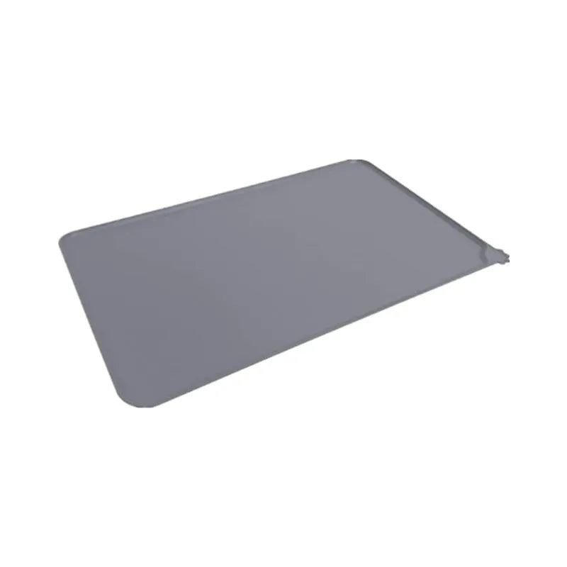 Silicone pet feeding placemat in blue colour under a dog bowl