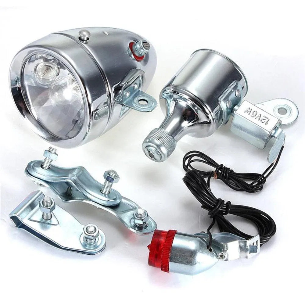 Silver bicycle dynamo generator light modification kit with wiring for headlight and tail light connections.
