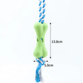 Porous bone rope knot dog chew toy with food compartments in green colour