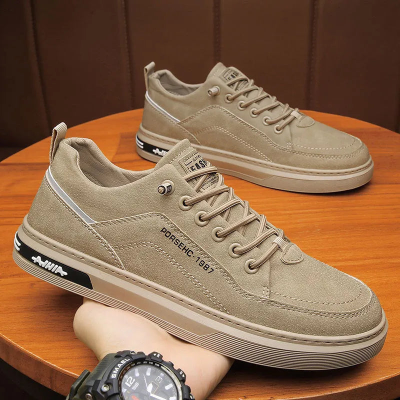 Men's khaki low-top casual shoes with round toe and flat rubber sole for work.