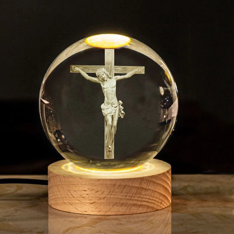 White crystal ball desk ornament on a wooden warm light base, showing purity-themed designs.