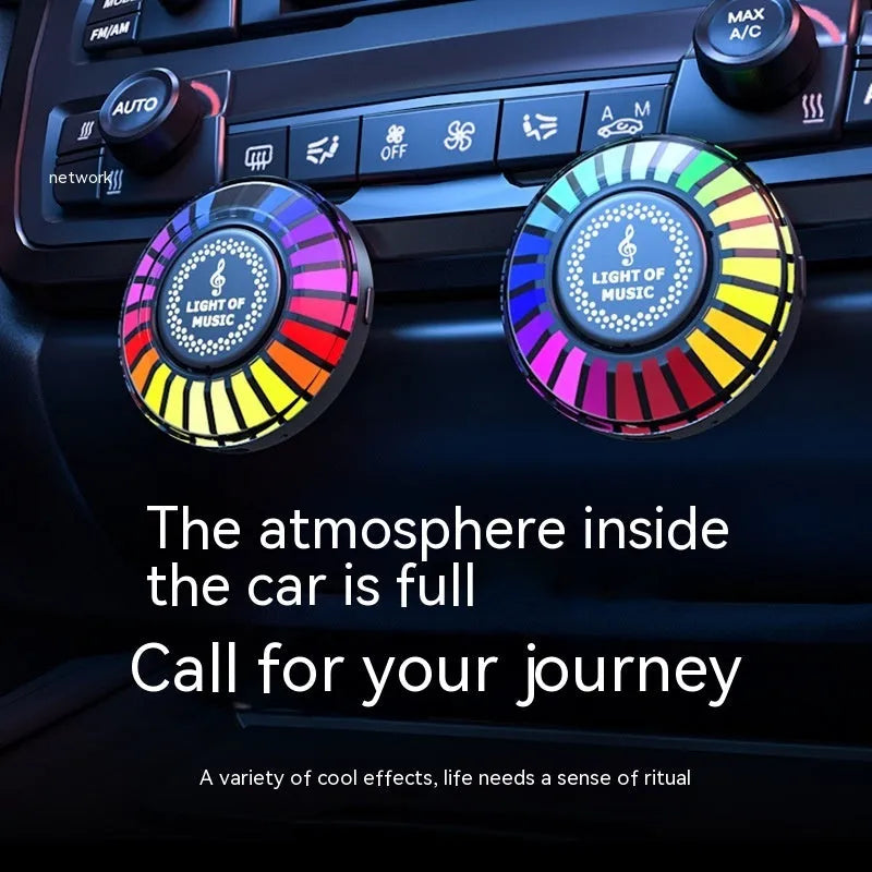Black square desktop RGB ambience light with magnetic base for car dashboard.