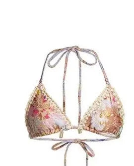Women's creamy-white floral bikini suit with skirt for beach vacations