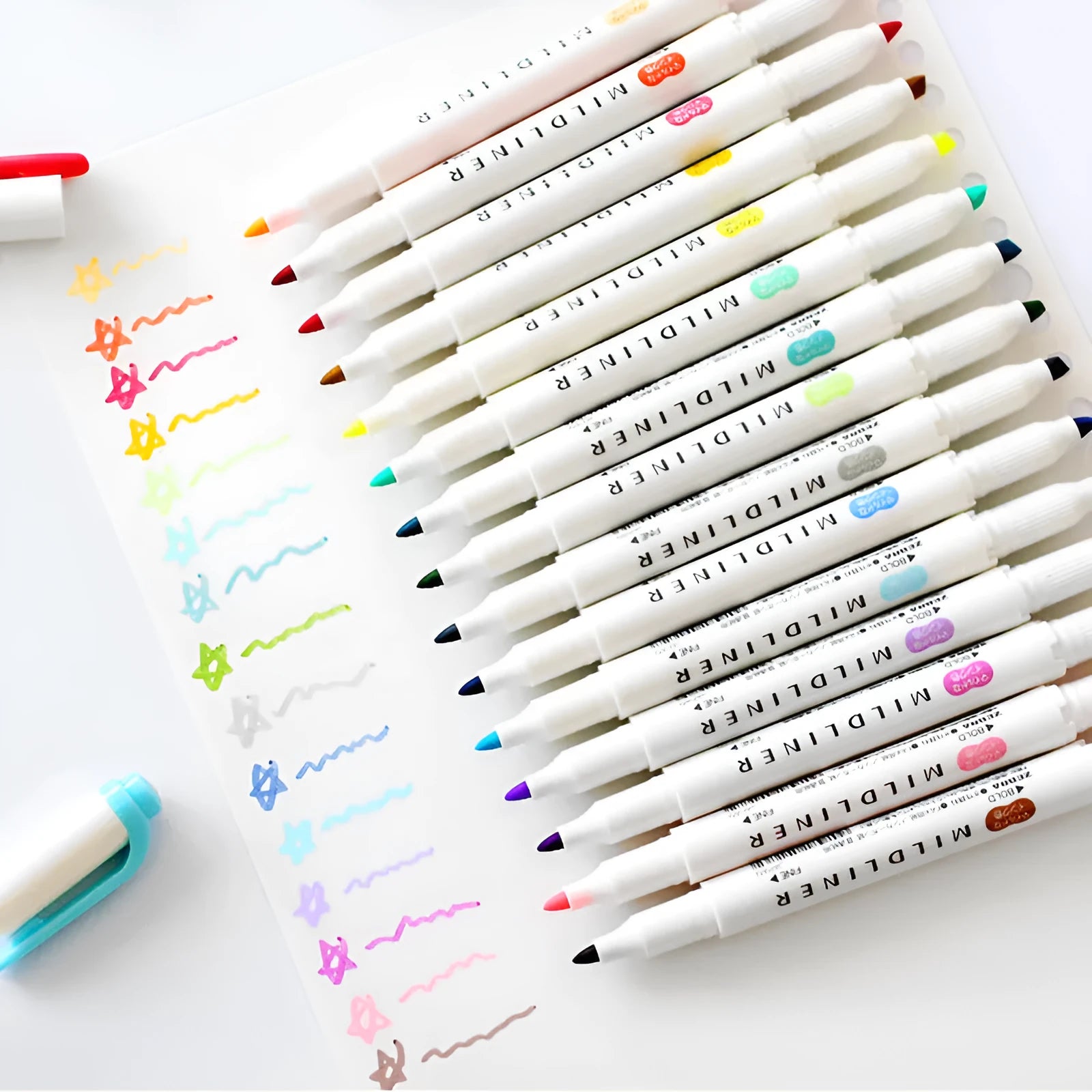 Double-headed colour marker pen with fine and broad tips, available in 42 shades including fluorescent and seasonal colours