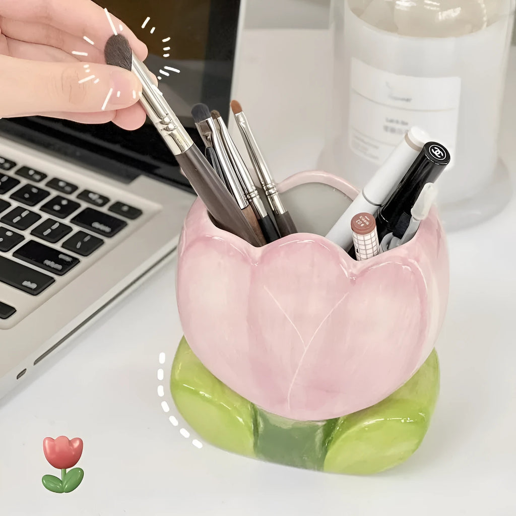 Ceramic flower pen holder storage box in a floral design on a desk