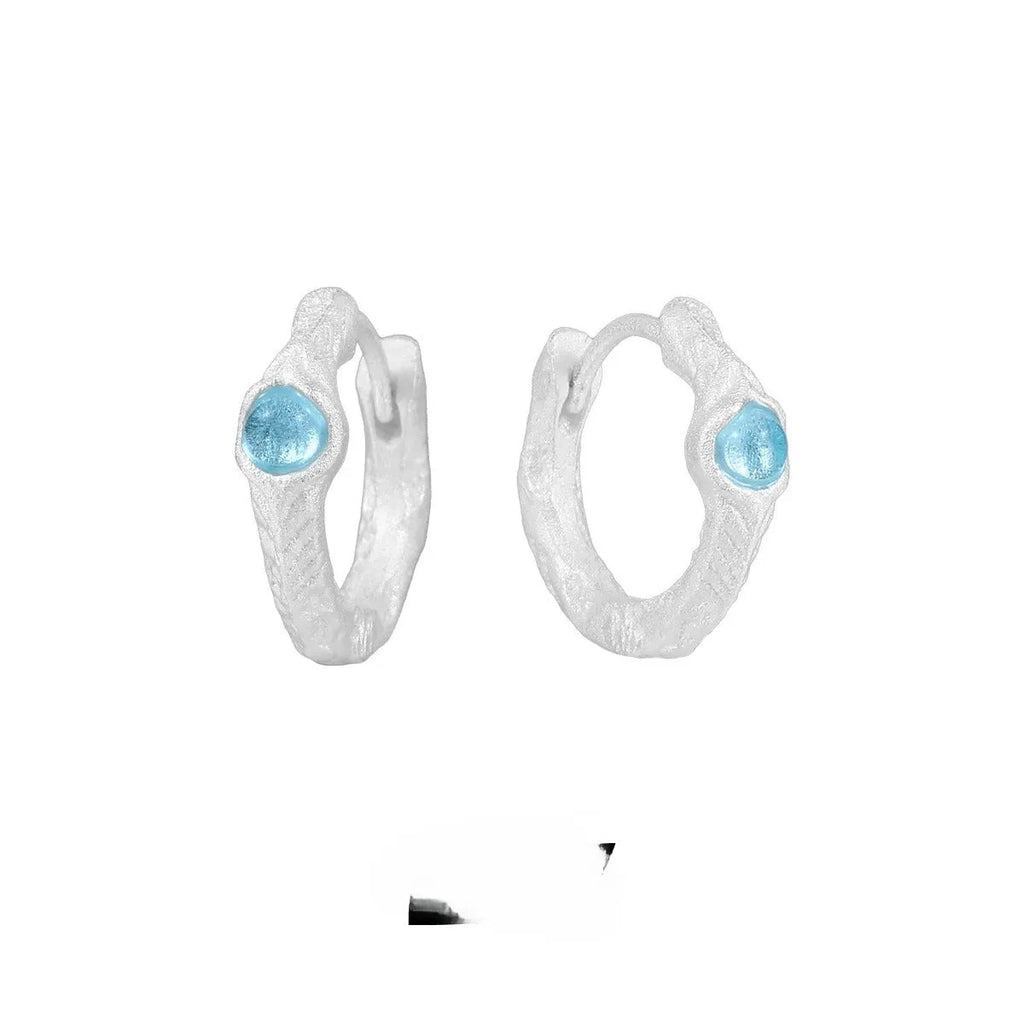 925 silver geometric round ear clip in burnt silver colour with clip-on mechanism, original design for women