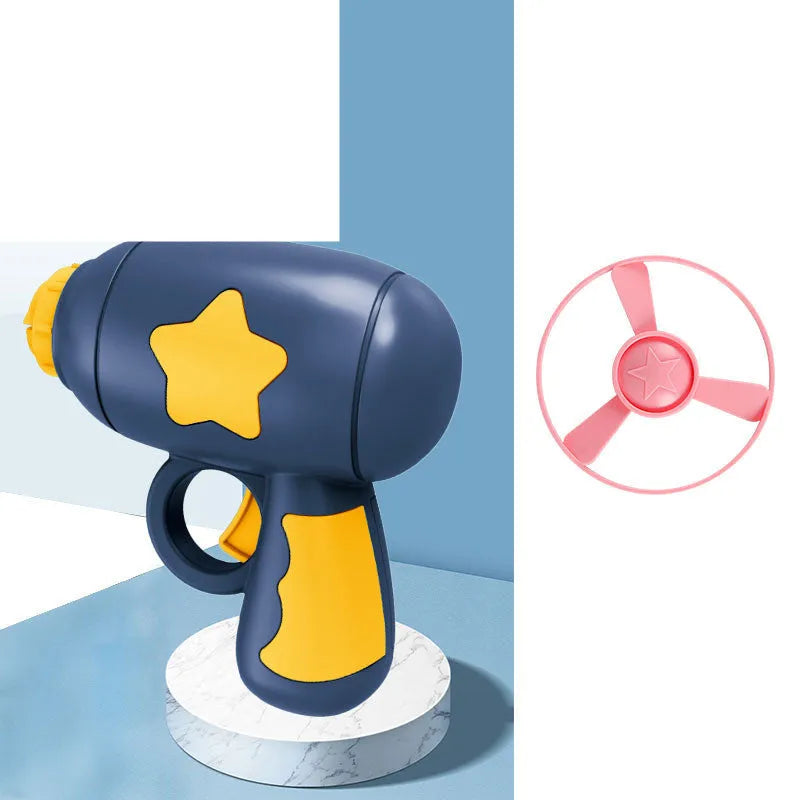 Blue LED flying saucer launcher toy set with gun, three luminous discs, and target board on packaging.