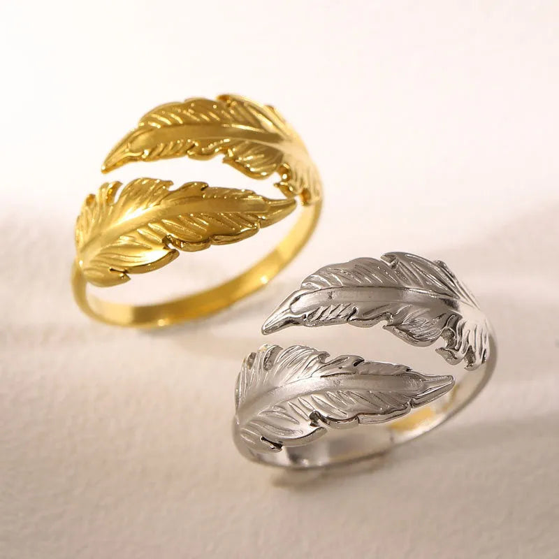 Women's adjustable feather design ring in gold and silver titanium steel options