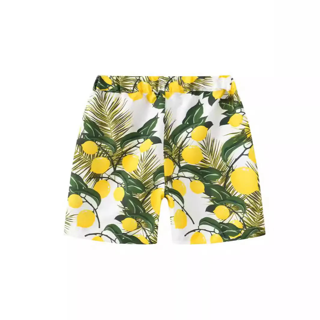 Printed beach shorts with elastic waistband in multiple colour patterns including coconut trees and pineapple design