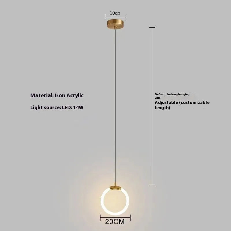 Modern Nordic style U-shaped white pendant light hanging above a wooden bedside table.