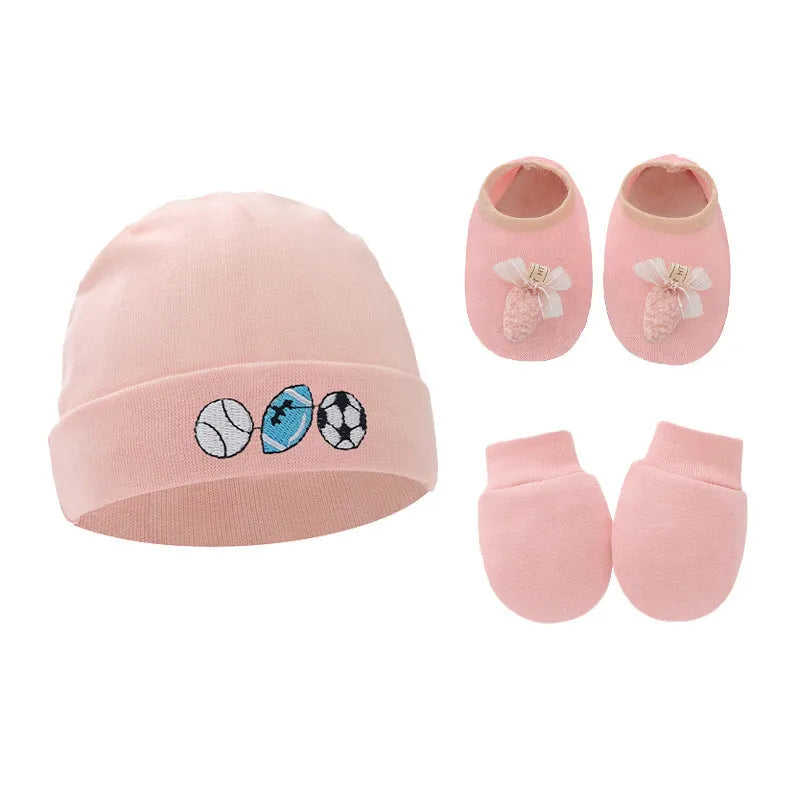 Set of white, light blue, and grey cotton baby pullover caps, gloves, and foot covers for infants.
