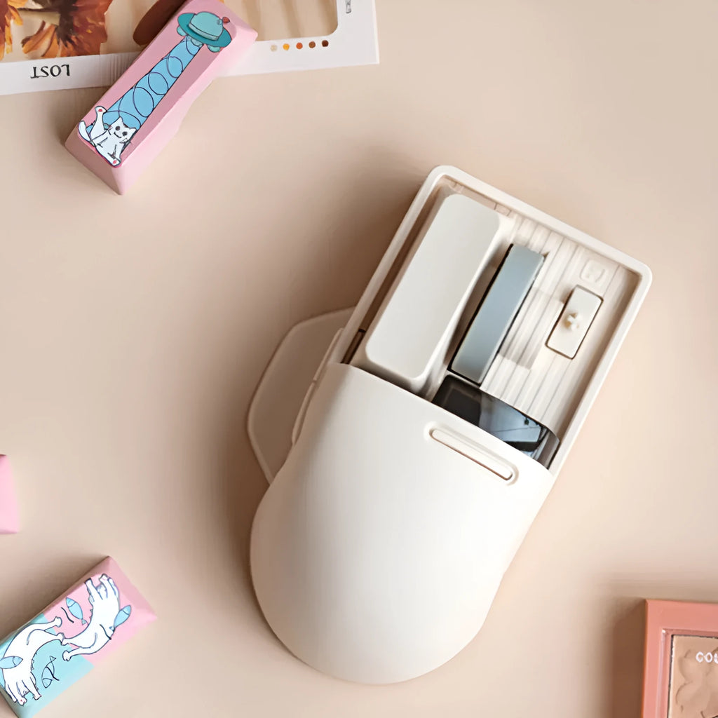 Xiaoqiao wireless mouse in tofu colour showing seven-button layout and Type-C charging port.