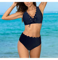 Women's red high waist split swimsuit with gathering detail on a mannequin.