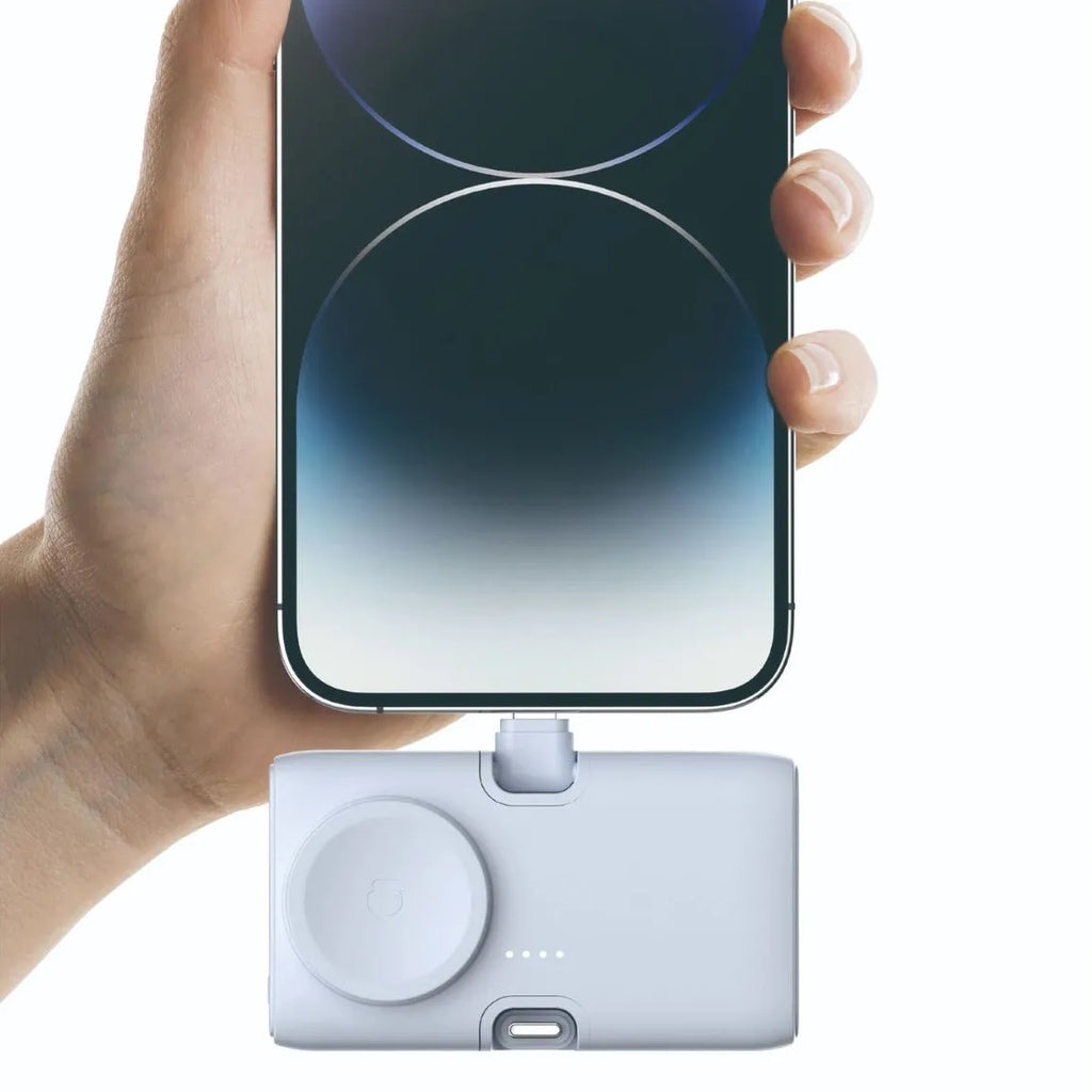 White plastic compact power bank showing 5000mAh capacity and 10.5x5x6cm dimensions