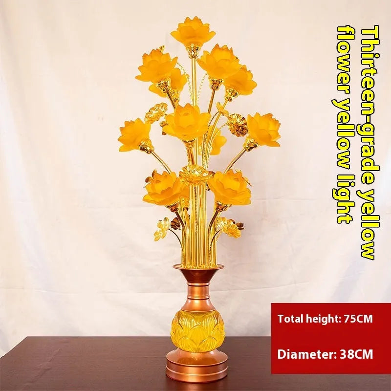 Coloured glaze pink and yellow LED lotus lantern for Buddha worship on an alloy stand.