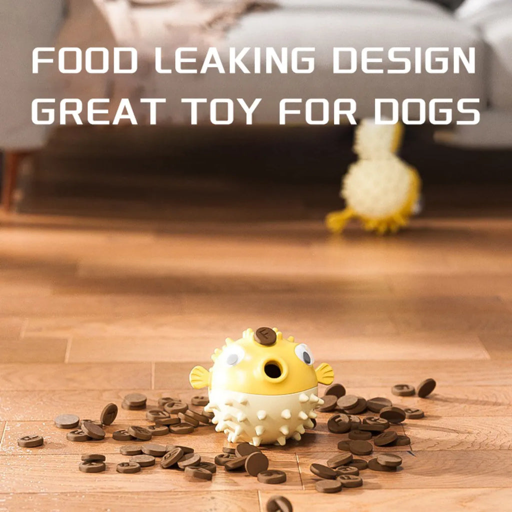 A yellow, fish-shaped durable dog chew toy with a textured surface and built-in squeaker.
