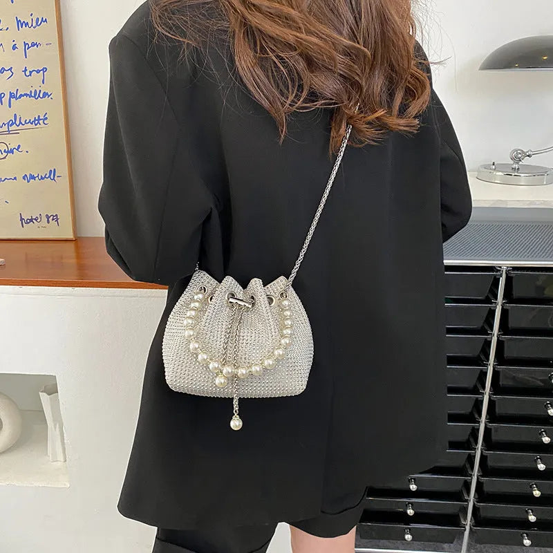 Western style light diamond crossbody bag with chain strap and bucket shape design in multiple colour options