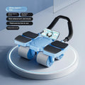 Black automatic rebound abdominal wheel with four blue wheels and textured handles on a wooden floor.