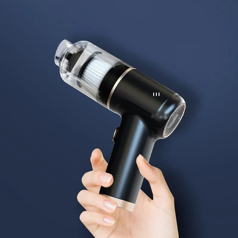 Black wireless car vacuum cleaner with multiple nozzle attachments and USB charging cable
