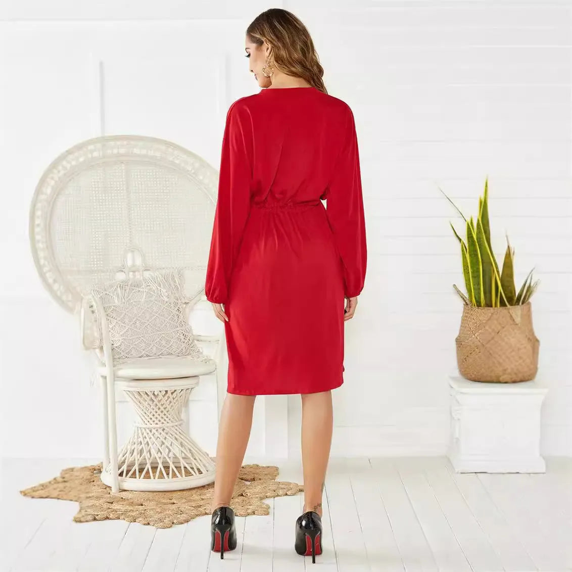 Black polyester A-line midi dress with long sleeves and a detachable belt.